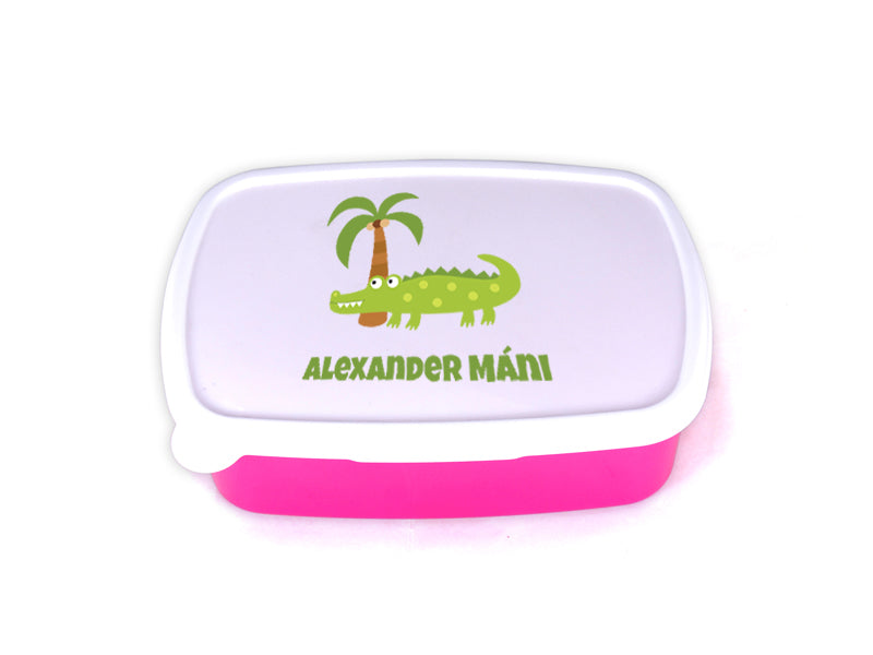 Bleikt nestisbox með krókódíl og nafni barnsins